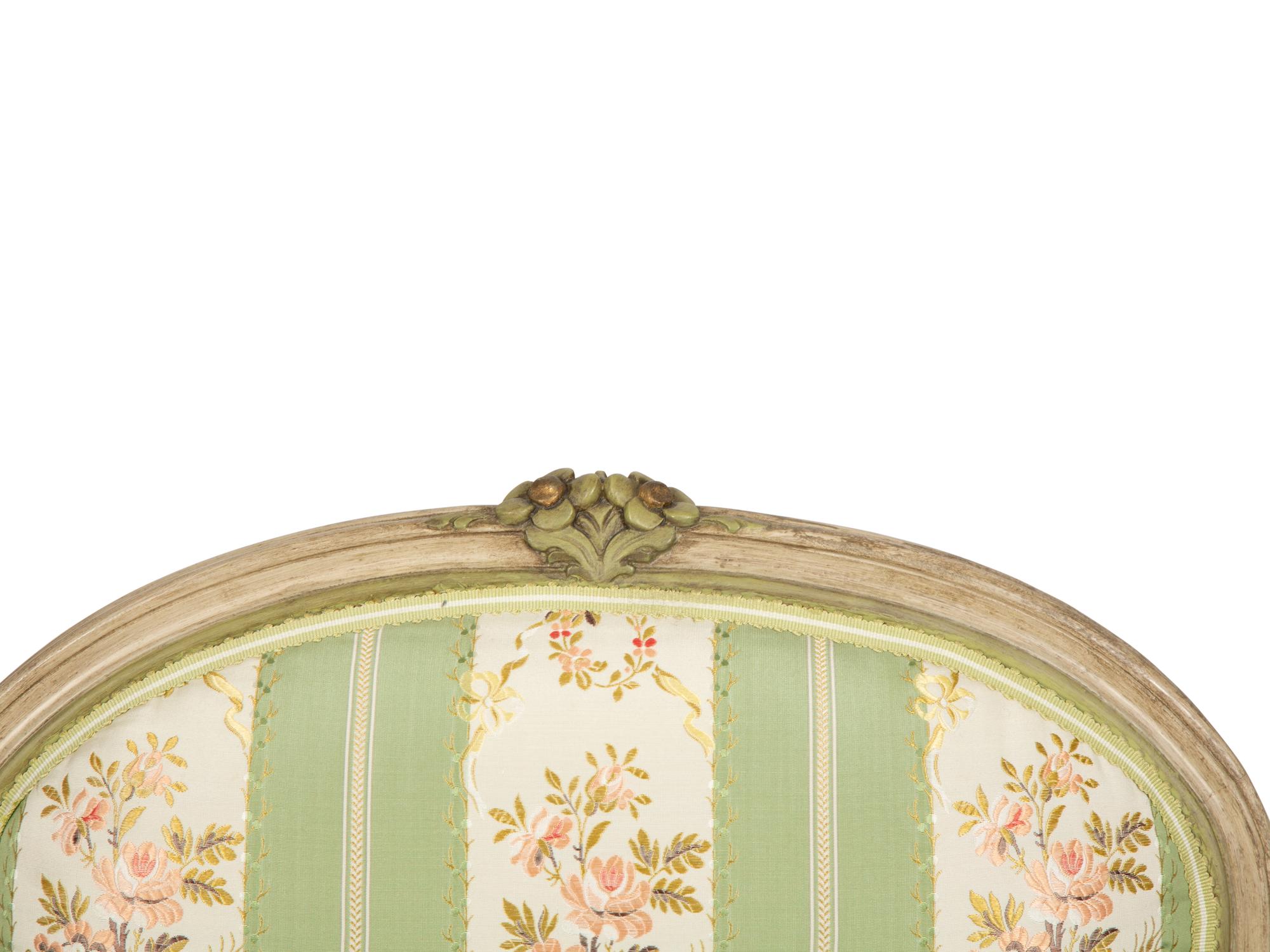 A Pair of Louis XV Style Green-Painted Fauteuils