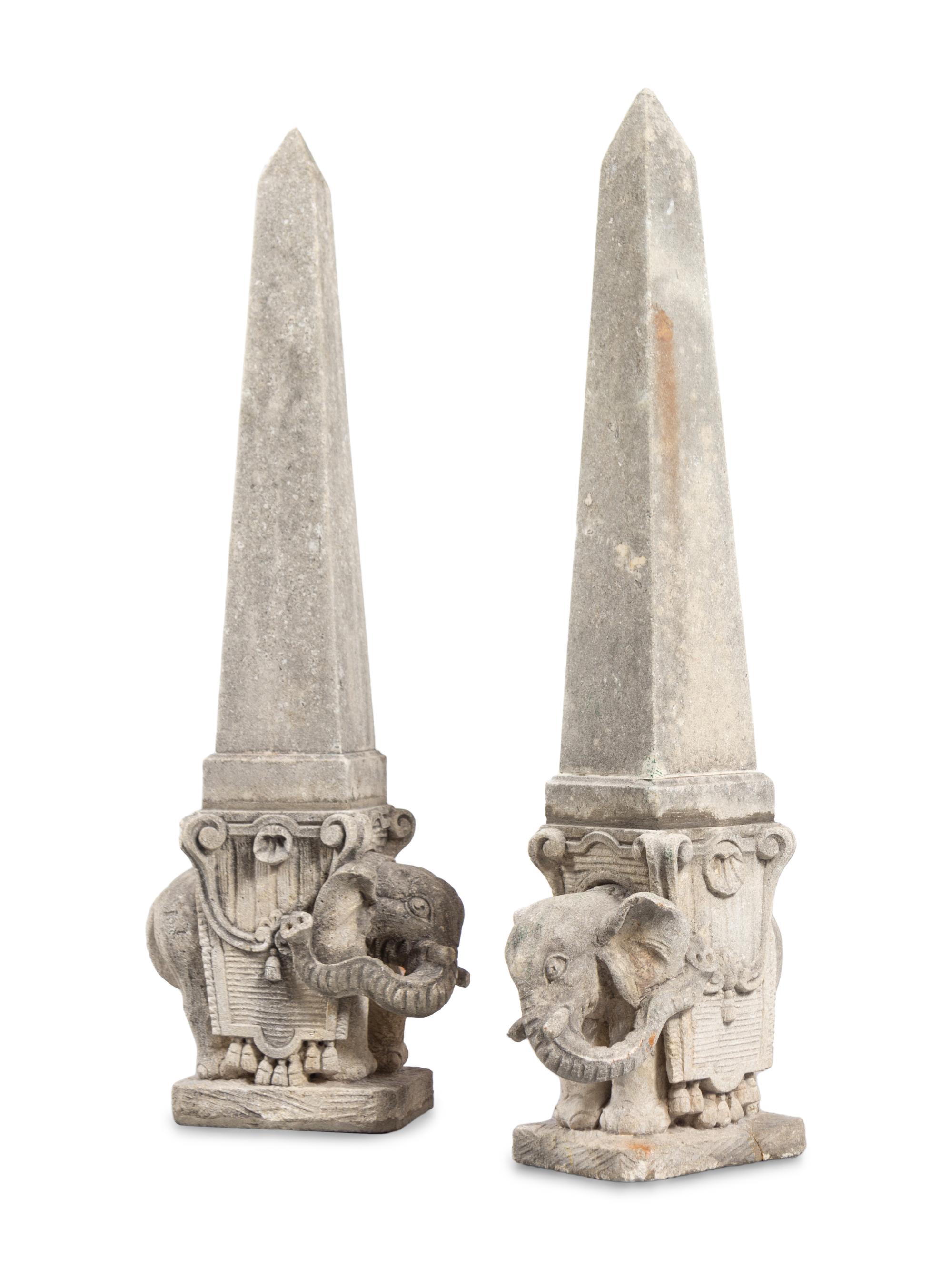 A Pair of Large Cast Stone Elephant Obelisks