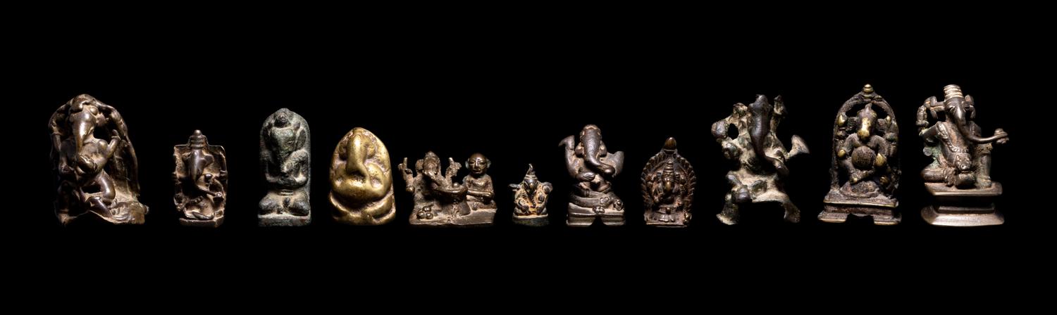 22 Small Indian Bronze Figures of Ganesha