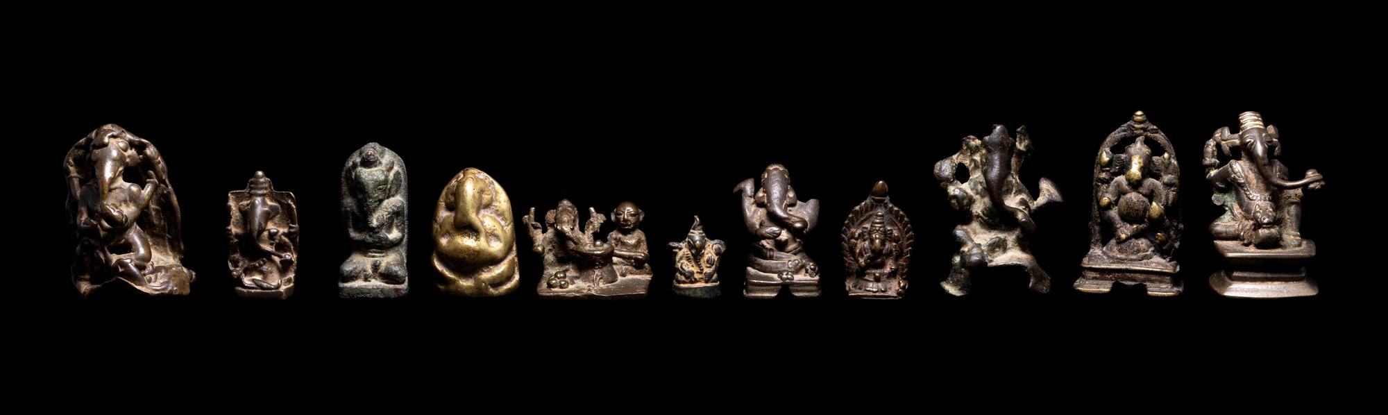 22 Small Indian Bronze Figures of Ganesha