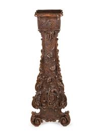 An Italian Baroque Style Carved Walnut Pedestal