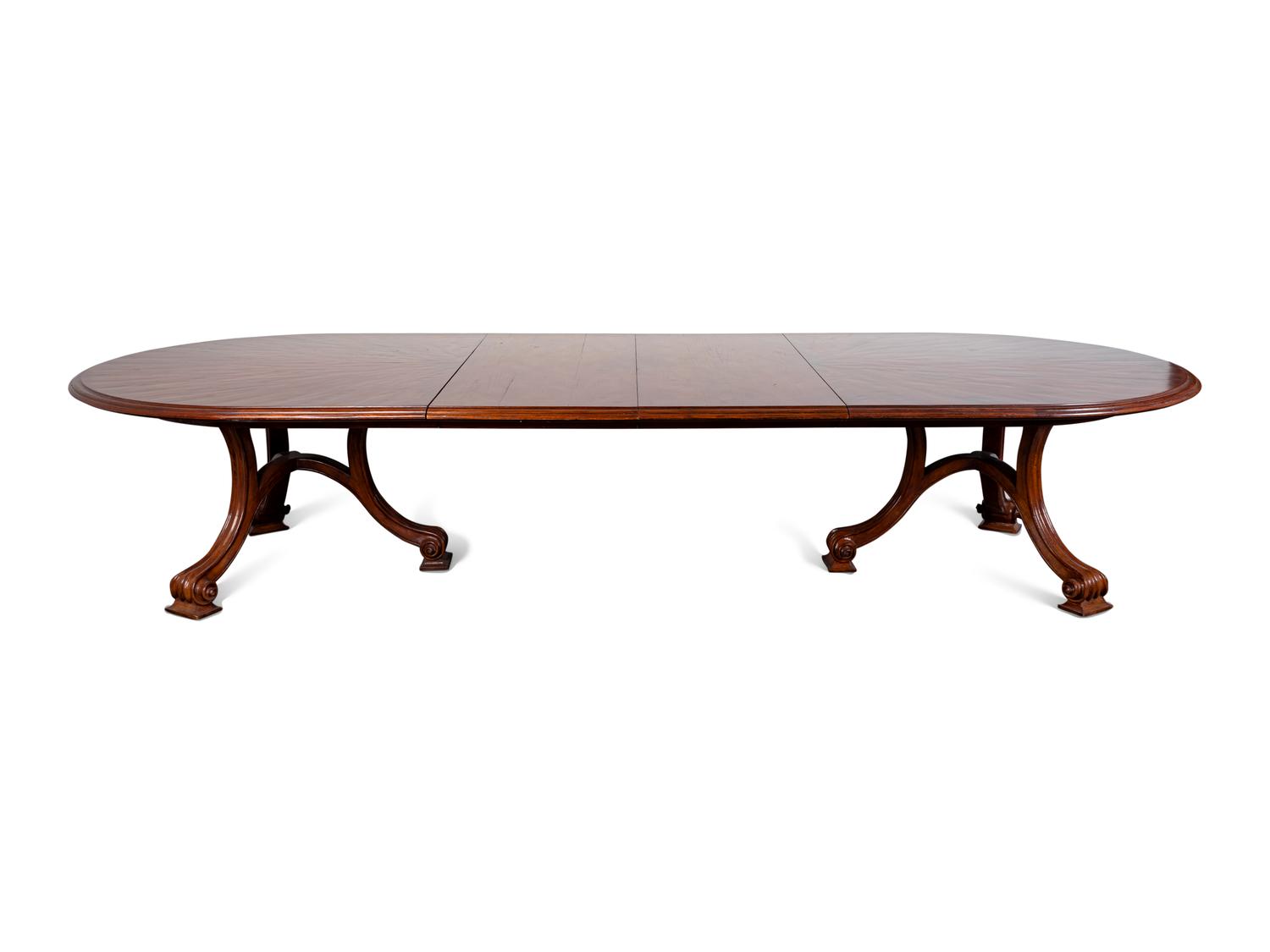 A Carved Walnut Two Pedestal Banquet Table by Therien Studio Workshops — 20TH CENTURY