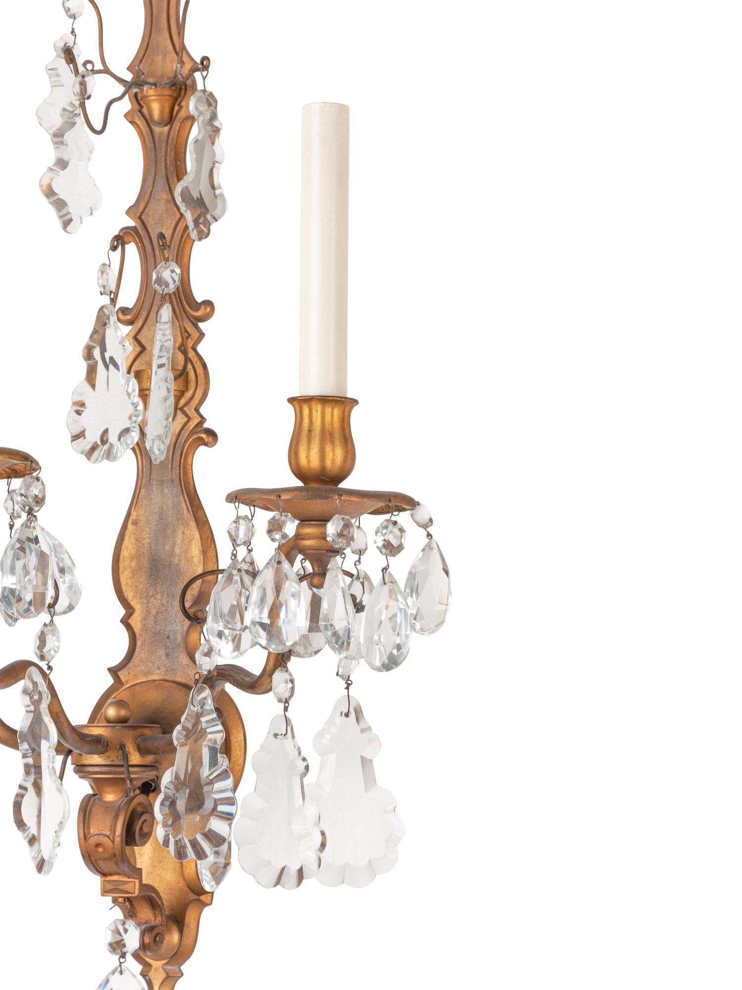 A Set of Six Napoleon III Style Gilt Metal and Glass Three-Light Sconces