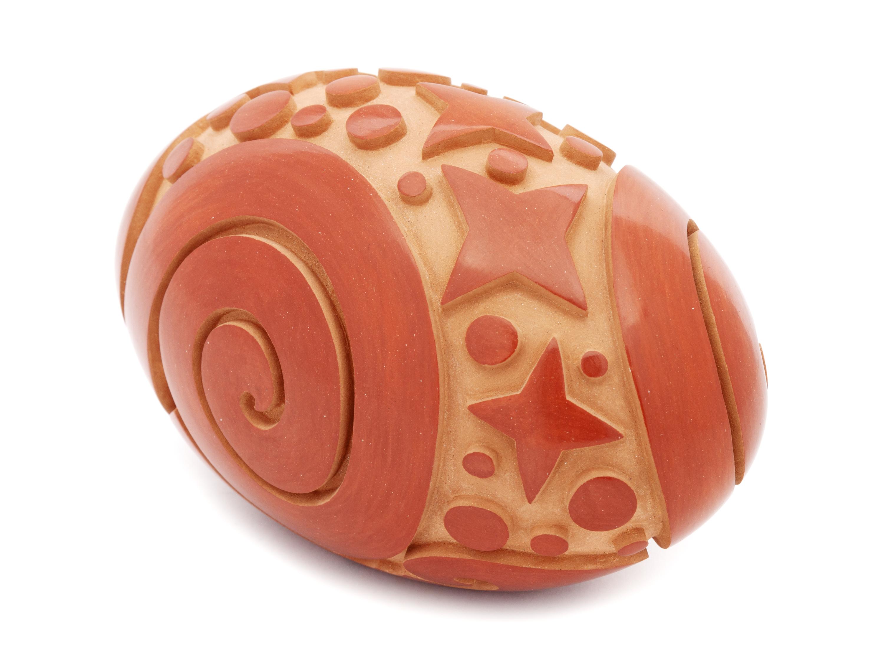 Polished and Carved Redware Pottery Vessel, with stars and swirls