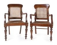 A Near Pair of Anglo-Colonial Teak Armchairs