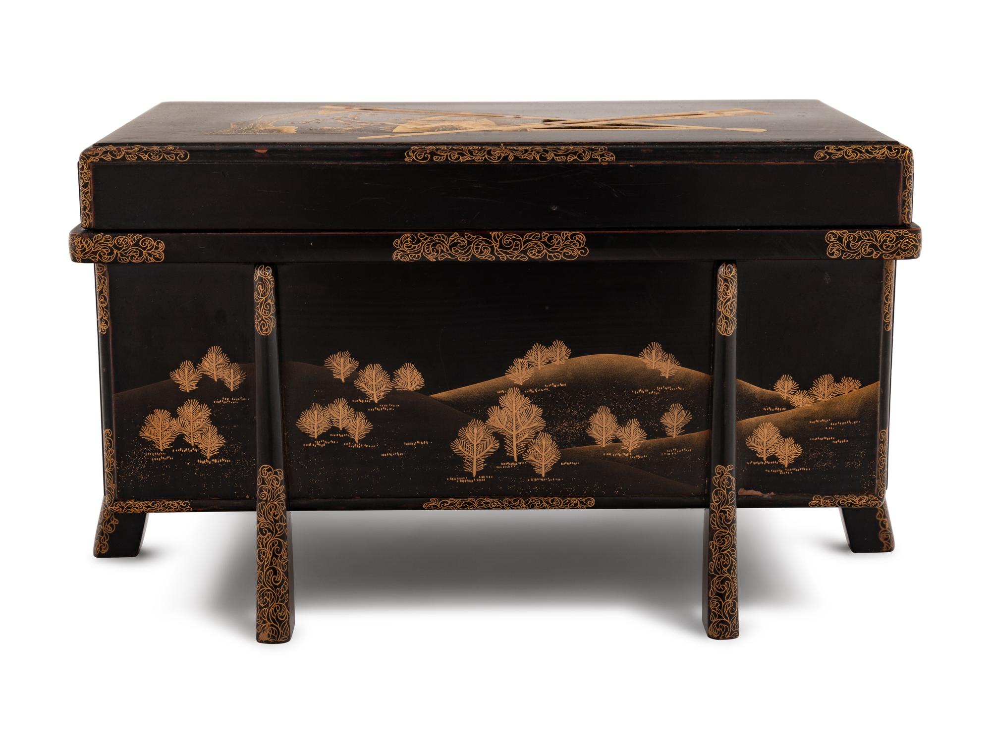 A Small Gilt Decorated Black Lacquer Trunk