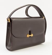 A Gucci Dark Brown Leather Flap Handbag, 8" x 6" x 2"; Strap drop: 14".