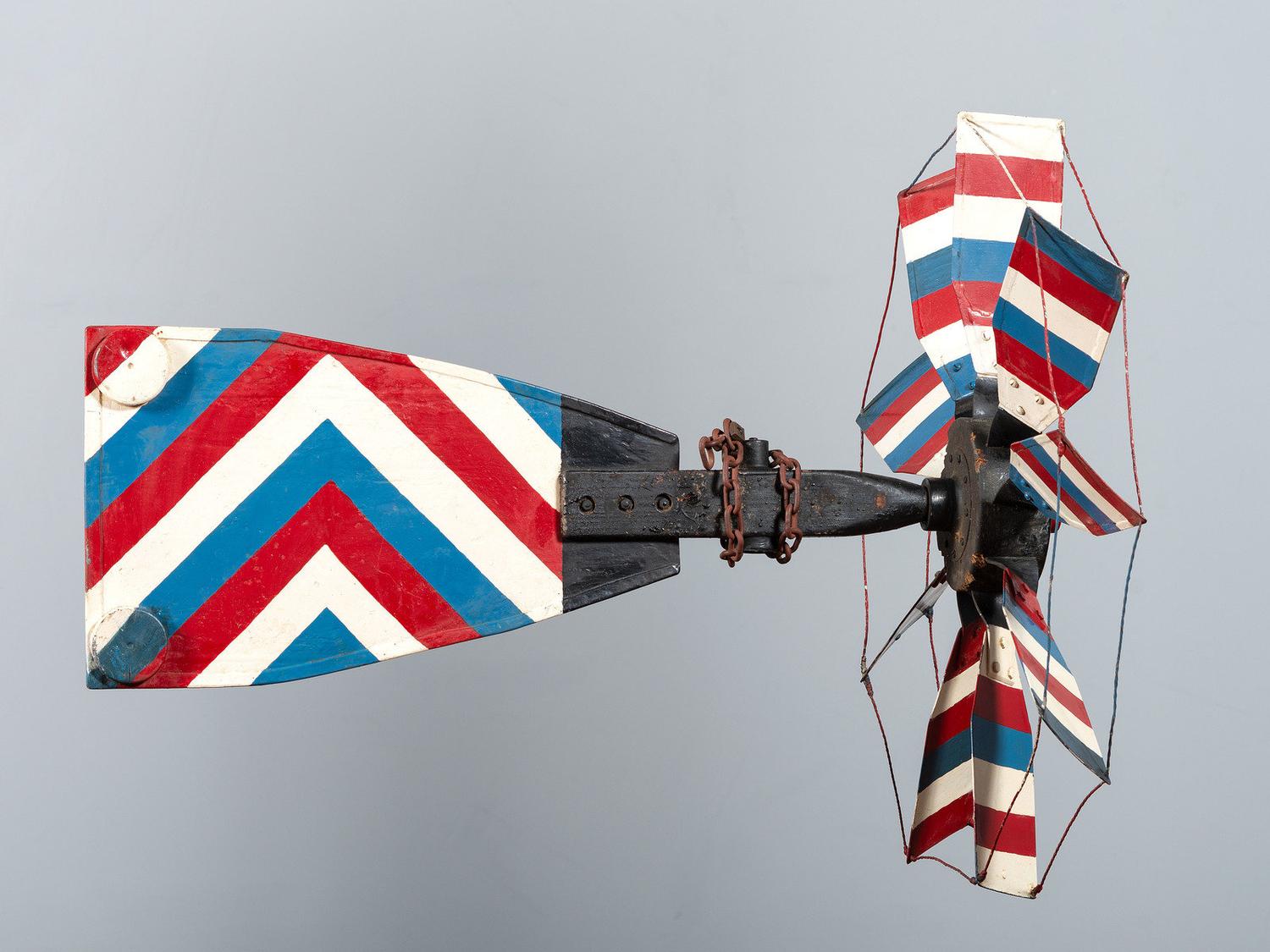 A Patriotic Red, White and Blue Painted Sheet Metal Whirligig