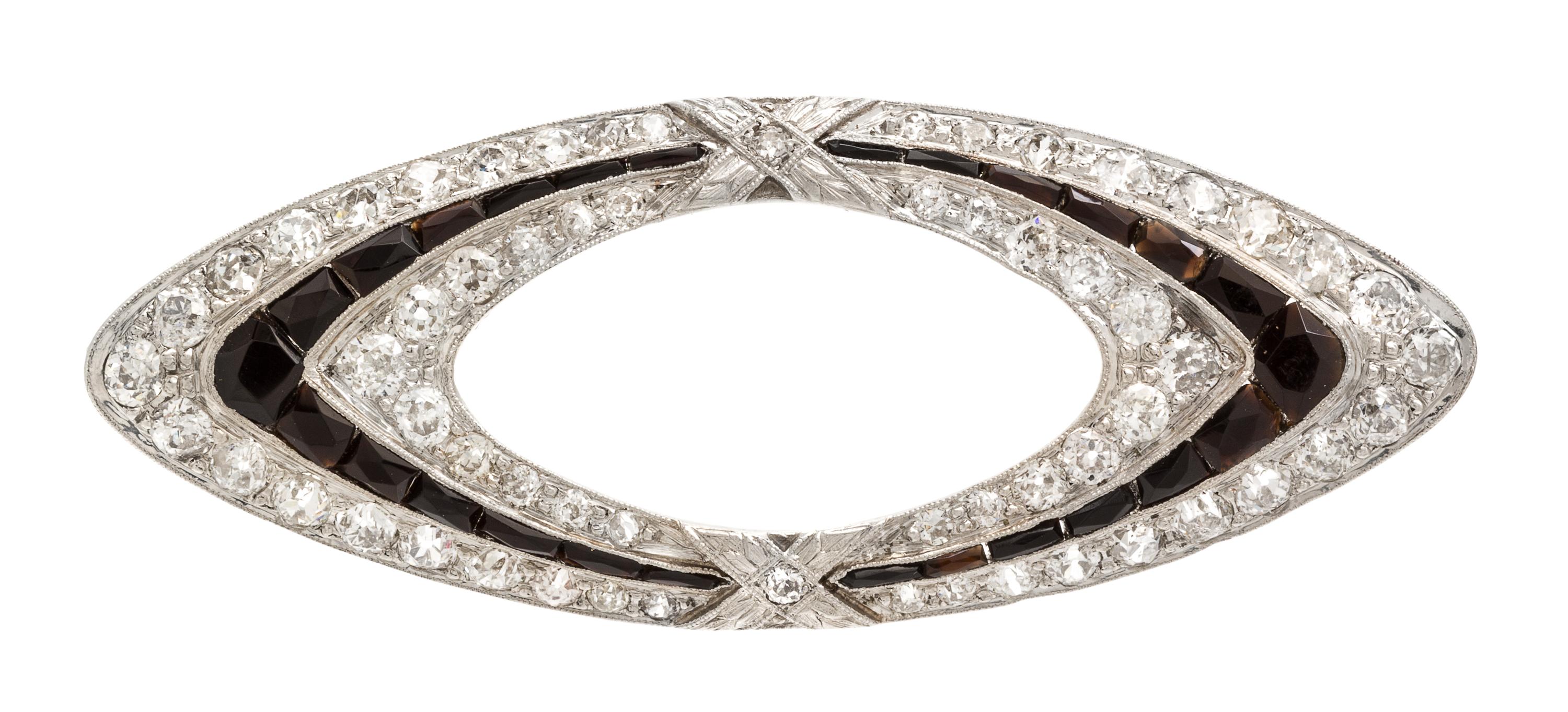 An Art Deco Platinum, White Gold, Onyx and Diamond Pendant/Brooch, 7.40 dwts.