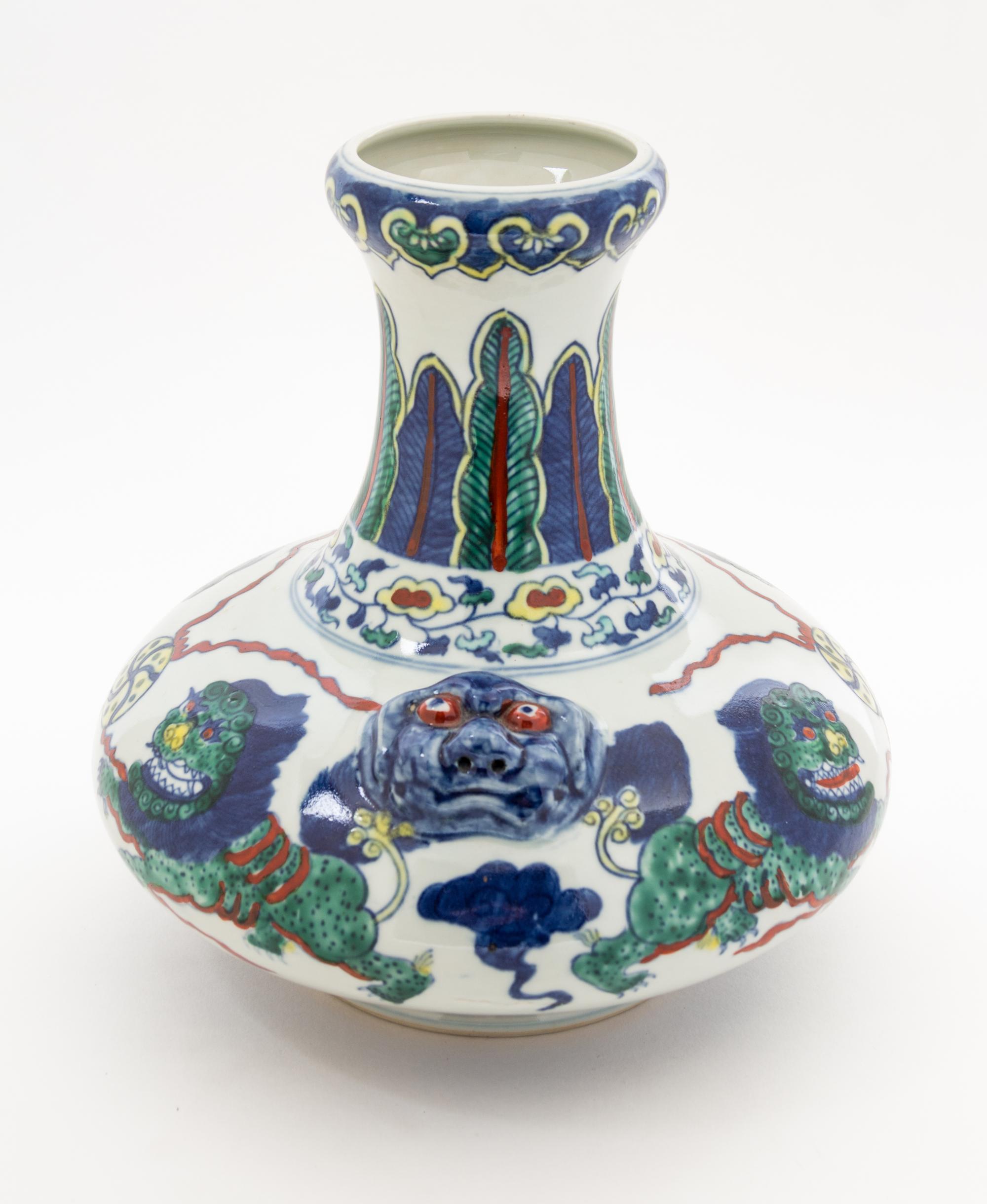 A Chinese Wucai Porcelain Vase Height 9 1/2 inches. — 20TH CENTURY