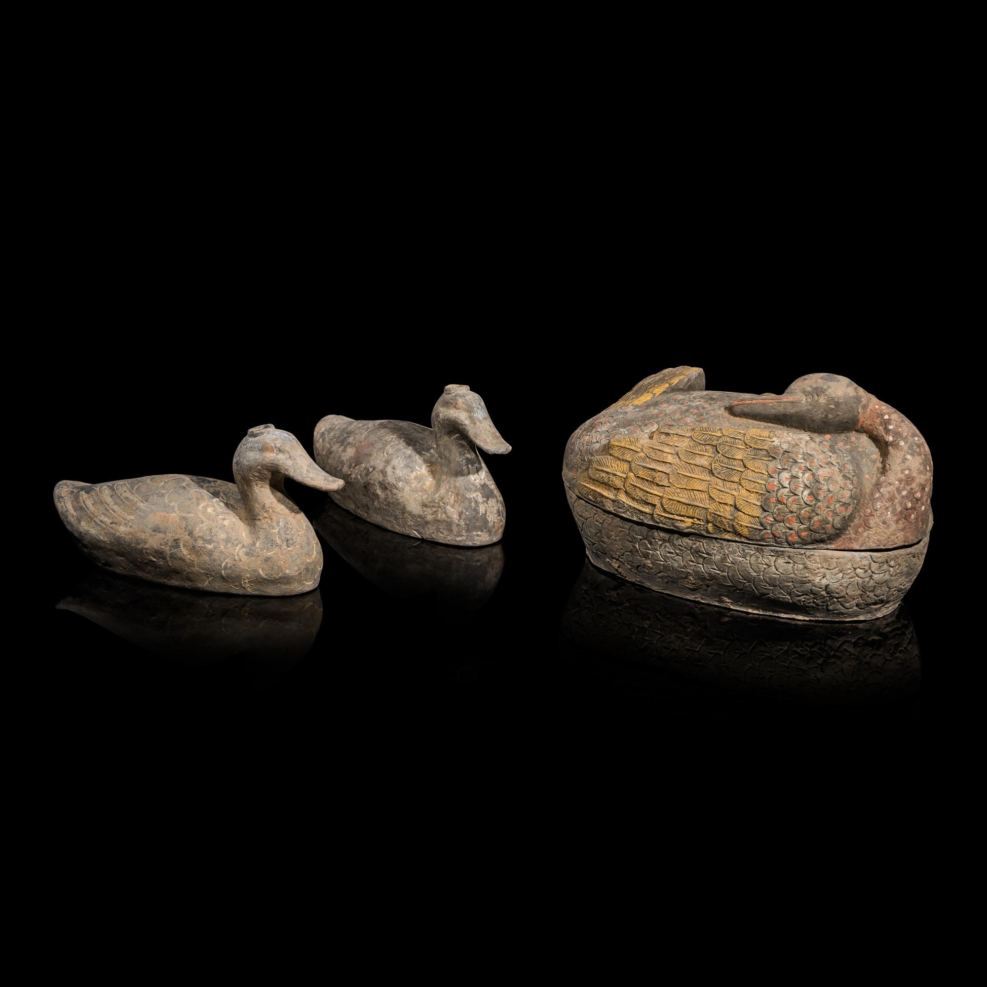 Three Chinese Painted Grey Pottery Figures of Ducks, Han Dynasty — 漢 灰陶彩繪大陶鴨三隻