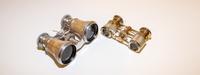 Two Pairs of French Mother-of-Pearl Veneered Opera Glasses Width of widest 4 1/4 inches. — EARLY 20TH CENTURY