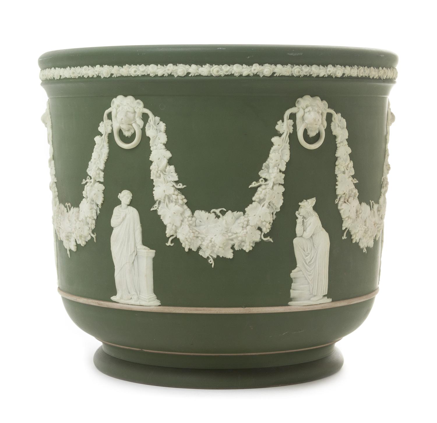 A Wedgwood Jasperware Jardiniere Height 9 x diameter 10 1/4 inches.