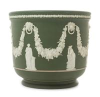 A Wedgwood Jasperware Jardiniere Height 9 x diameter 10 1/4 inches.