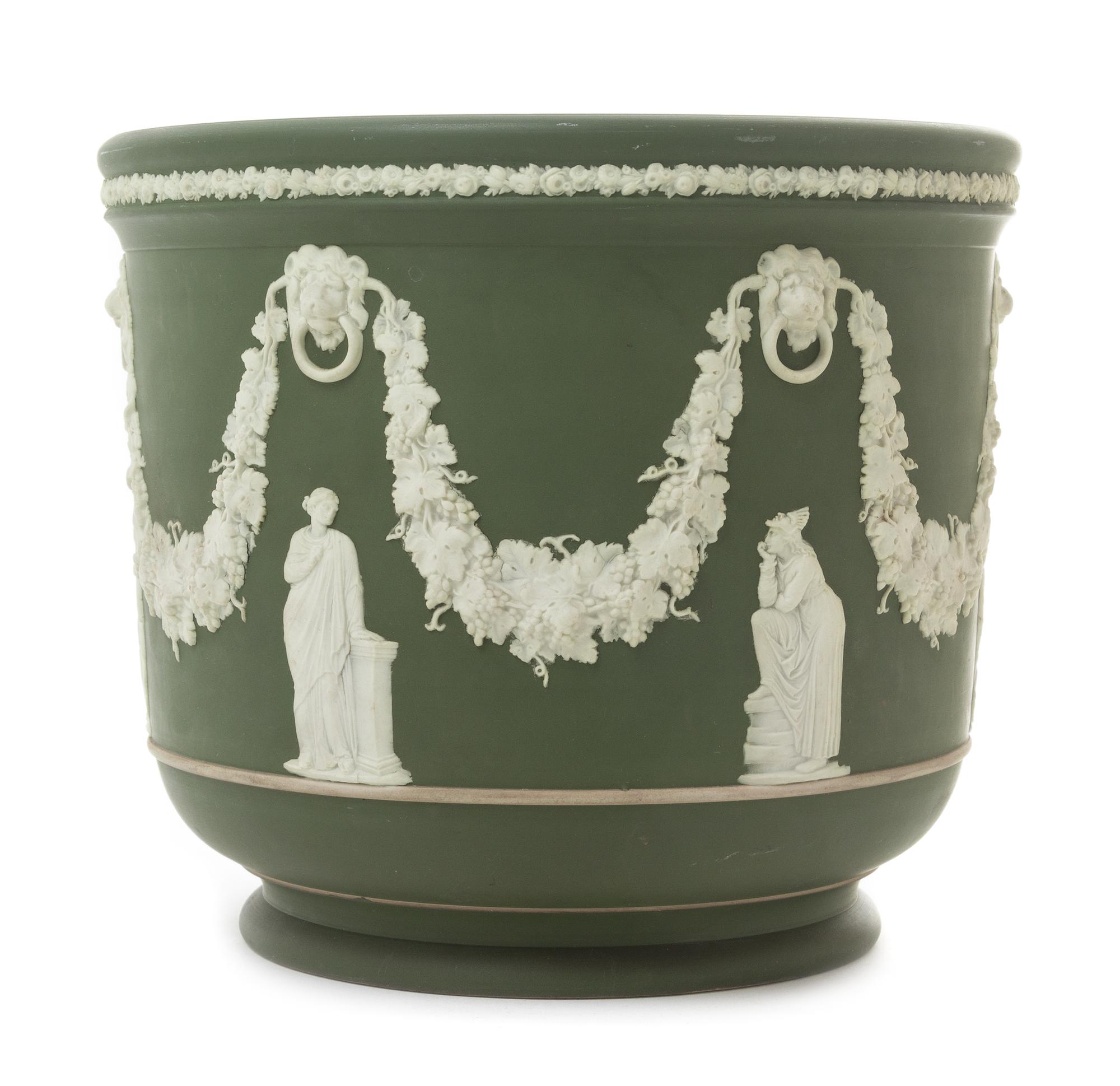 A Wedgwood Jasperware Jardiniere Height 9 x diameter 10 1/4 inches.
