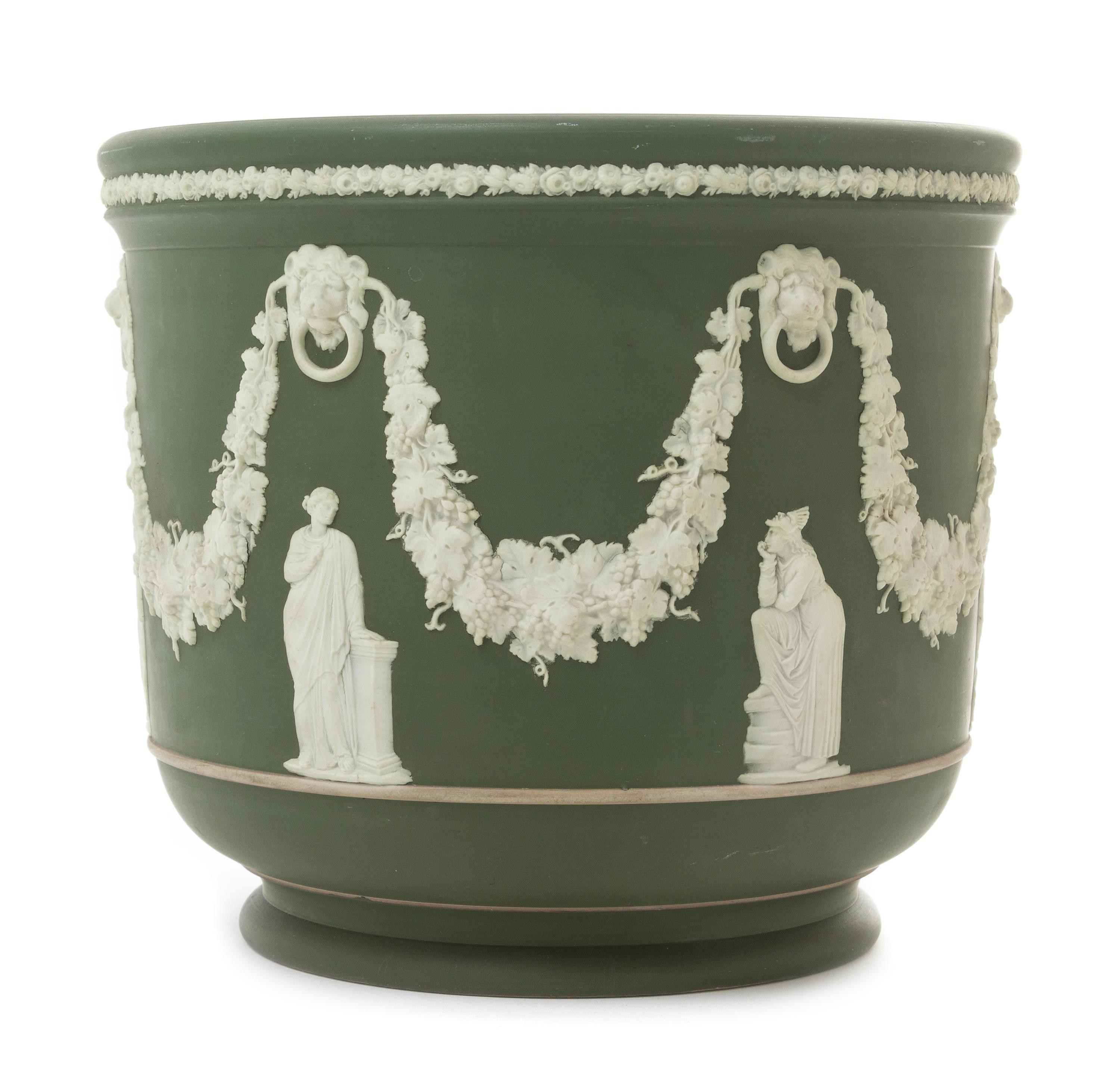 A Wedgwood Jasperware Jardiniere Height 9 x diameter 10 1/4 inches.