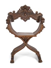 An Italian Renaissance Revival Carved Walnut Savonarola Chair