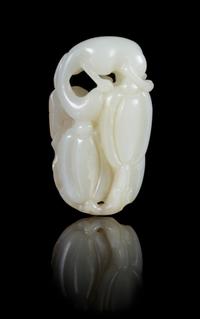 A Carved White Jade Toggle Height 2 1/4 inches.