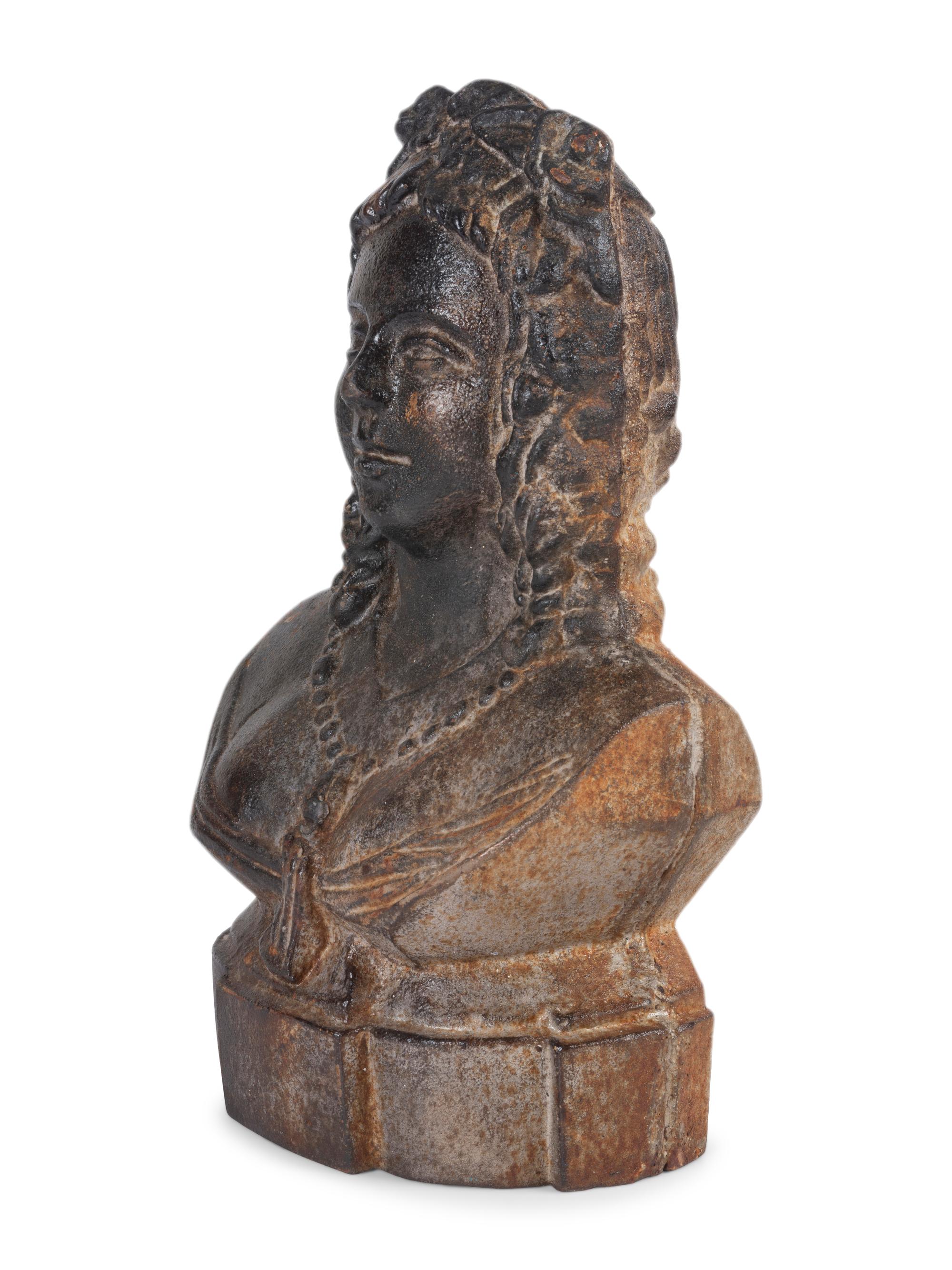 A Cast Iron Maiden-Form Door Stop