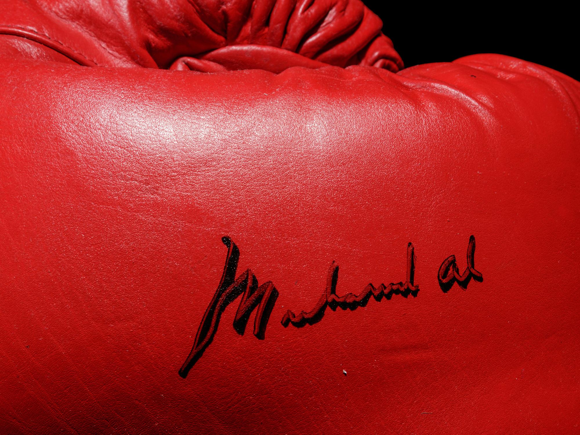 A Pair of Muhammad Ali Autographed Boxing Gloves (One Signed) Steiner,