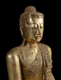 A Large Burmese Gilt Lacquered Figure of Buddha