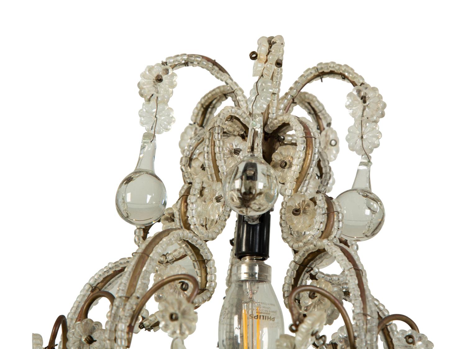 A Pair of Gilt Metal and Glass-Beaded Chandeliers