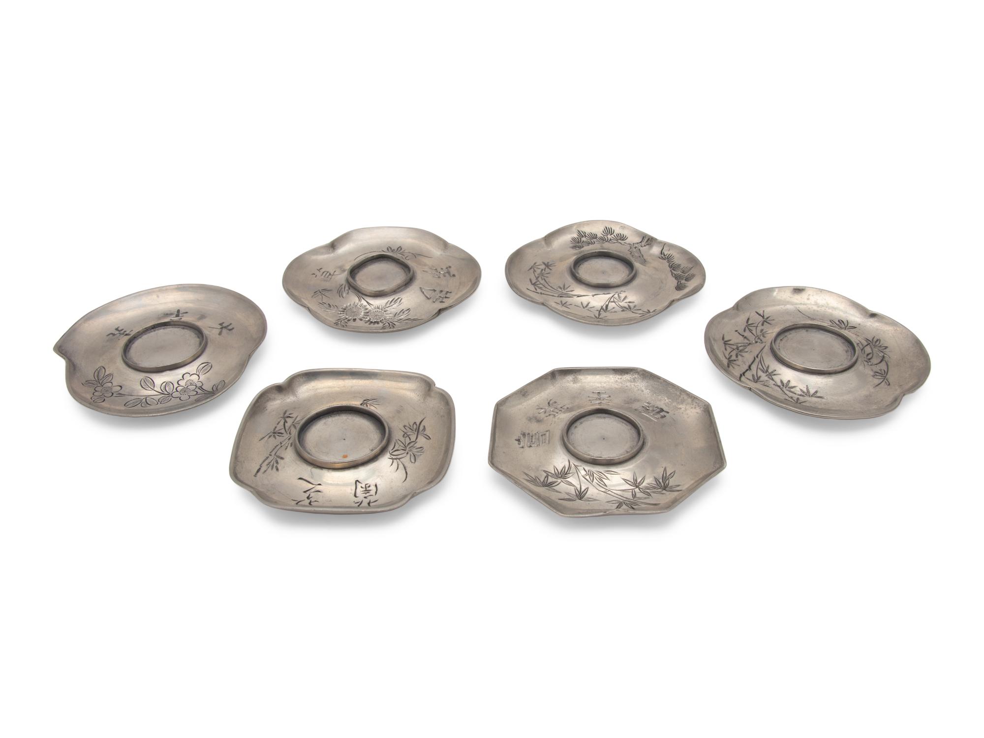 A Set of Six Chinese Pewter Cup Stands