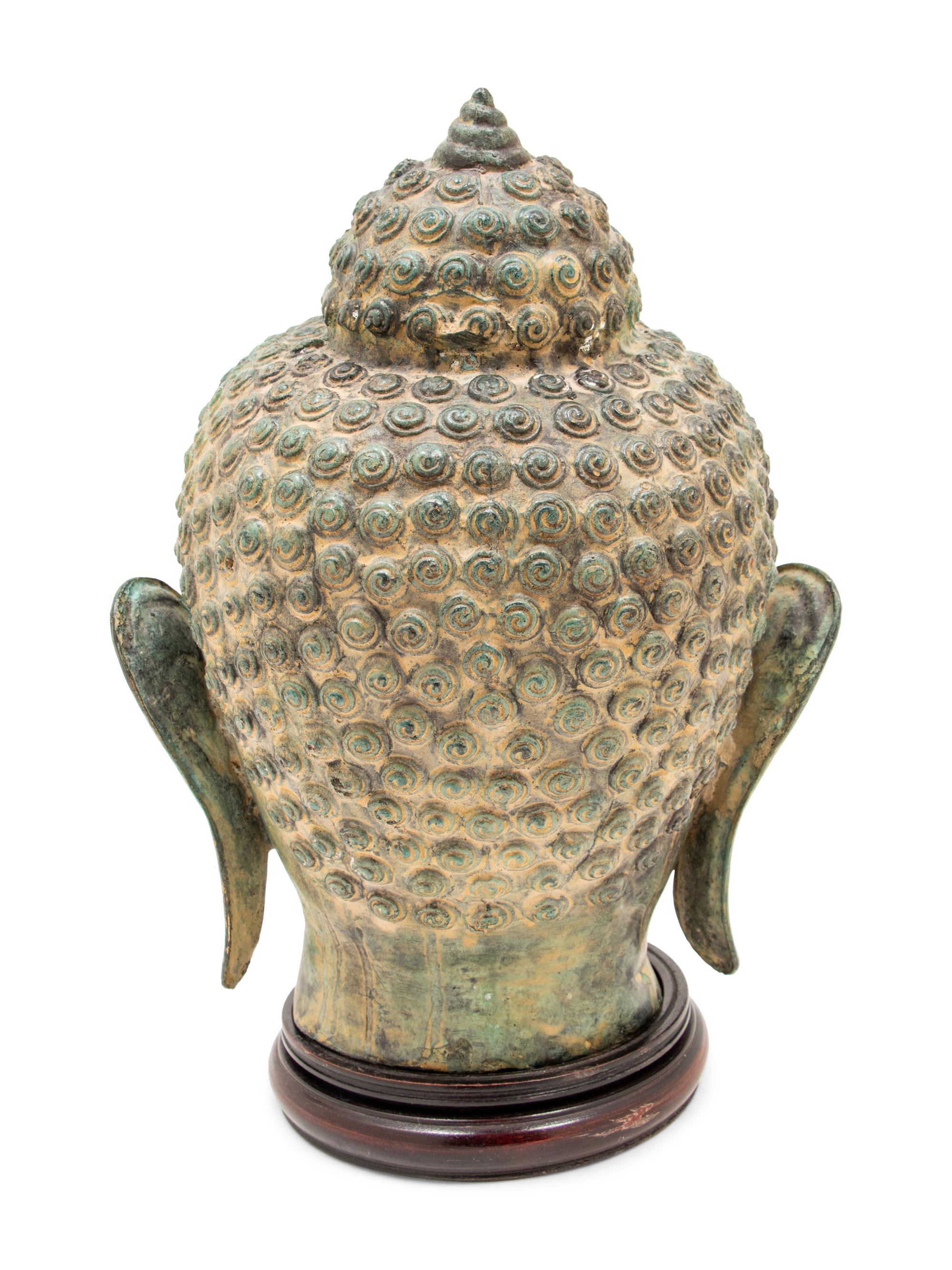 A Pair of Southeast Asian Deity Heads