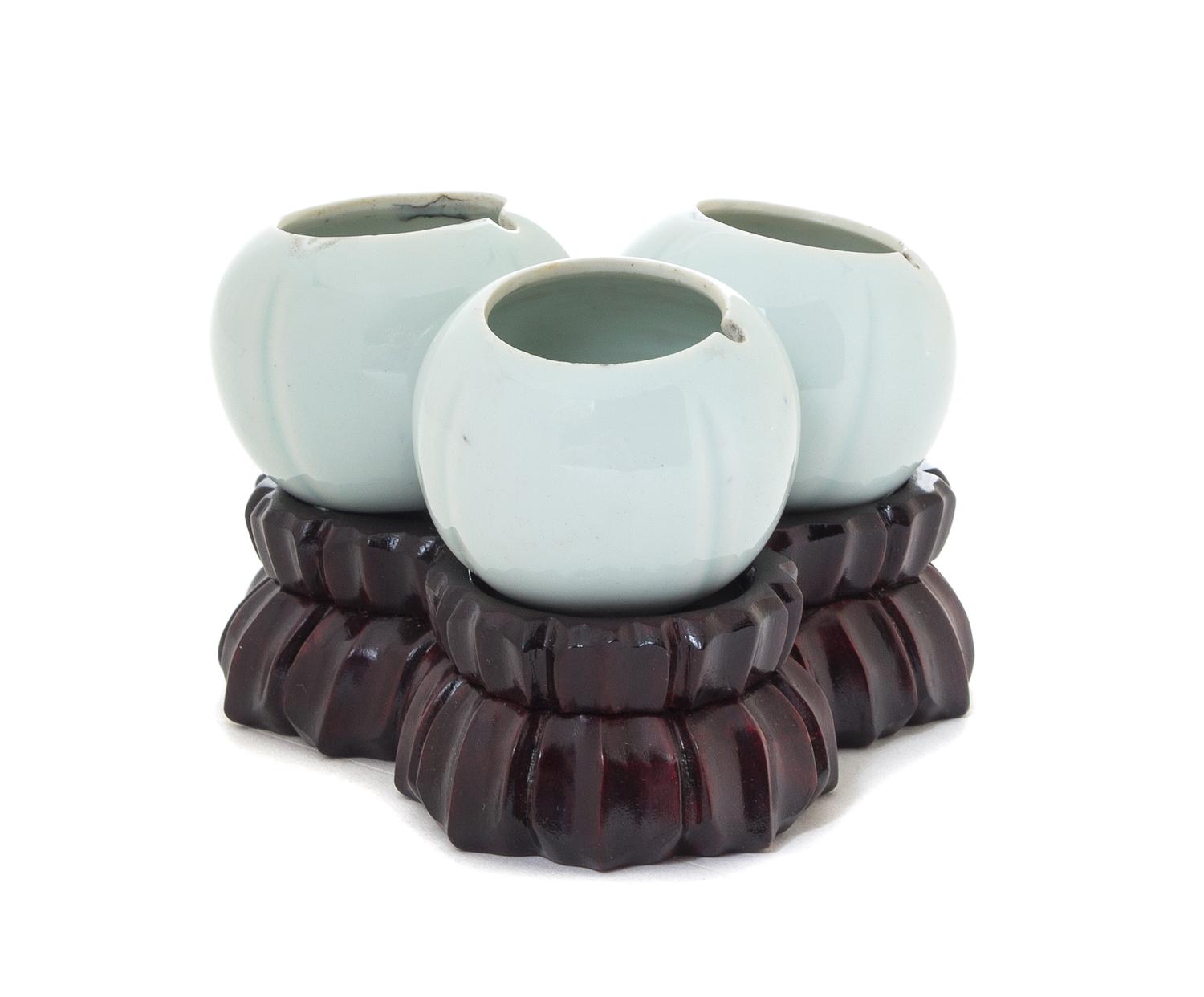 A Celadon Glazed Porcelain Water Dropper Height 1 3/4 inches. — 20TH CENTURY