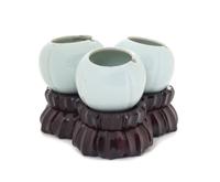 A Celadon Glazed Porcelain Water Dropper Height 1 3/4 inches. — 20TH CENTURY
