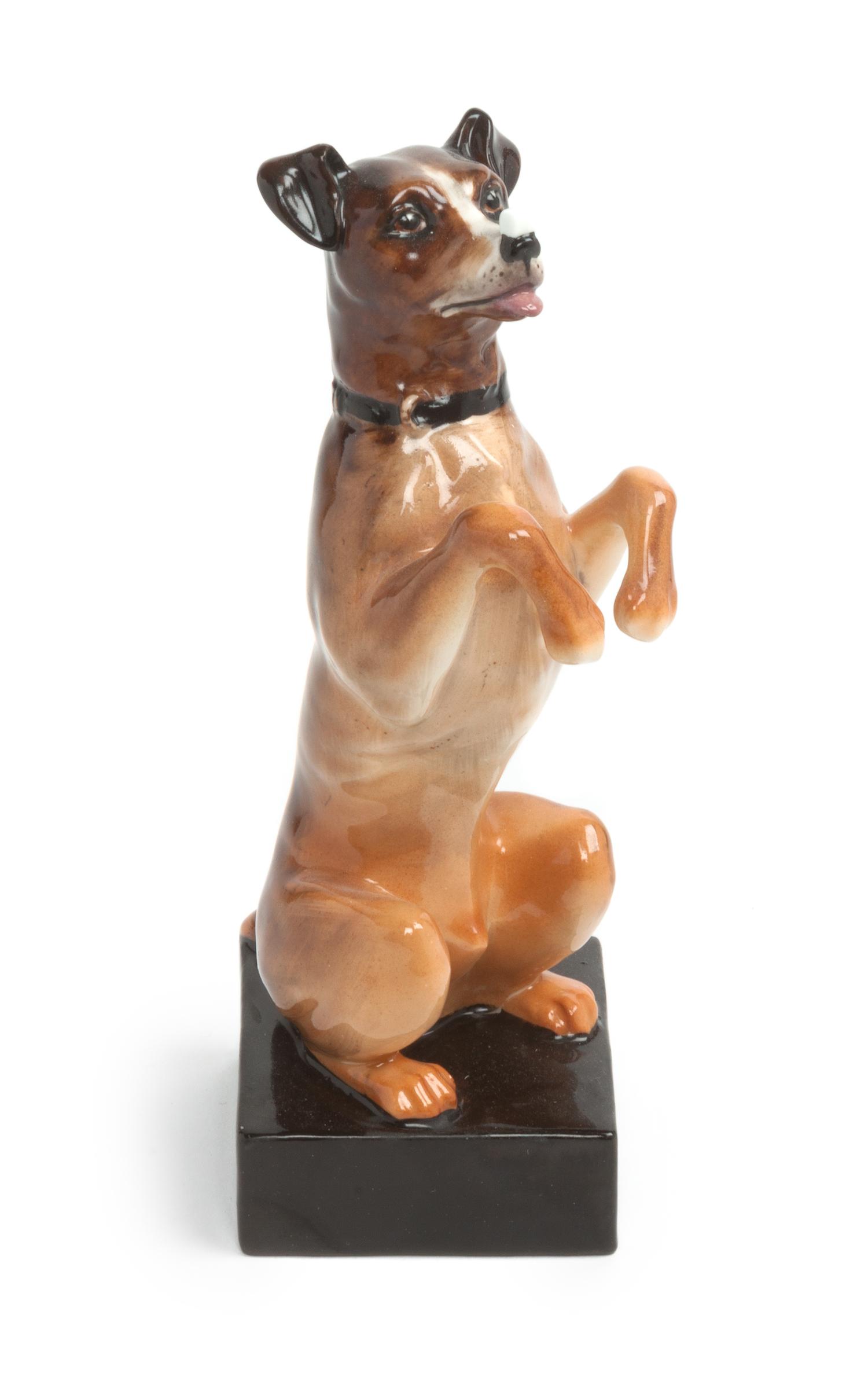 A Royal Doulton Porcelain Dog Height 8 1/2 inches.