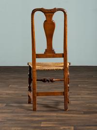 A Queen Anne Maple and Cherrywood Spanish-Foot Rush Seat Side Chair