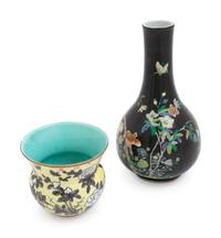 A Chinese Famille Noire Porcelain Bottle Vase and A Chinese Yellow Ground Grisaille Decorated Spitoon