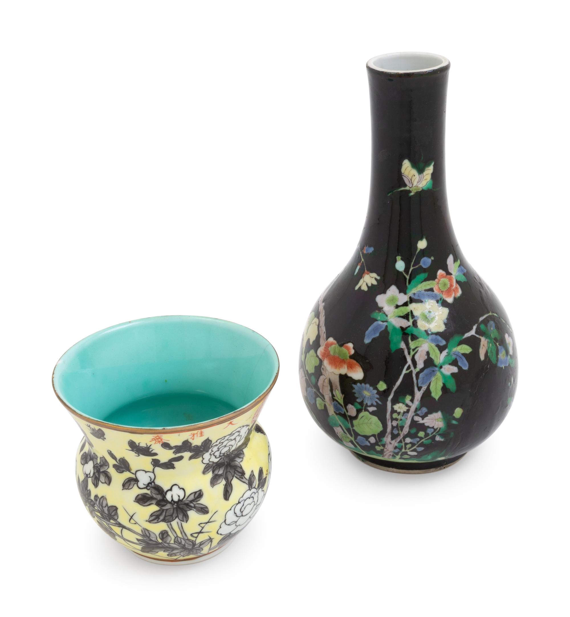 A Chinese Famille Noire Porcelain Bottle Vase and A Chinese Yellow Ground Grisaille Decorated Spitoon