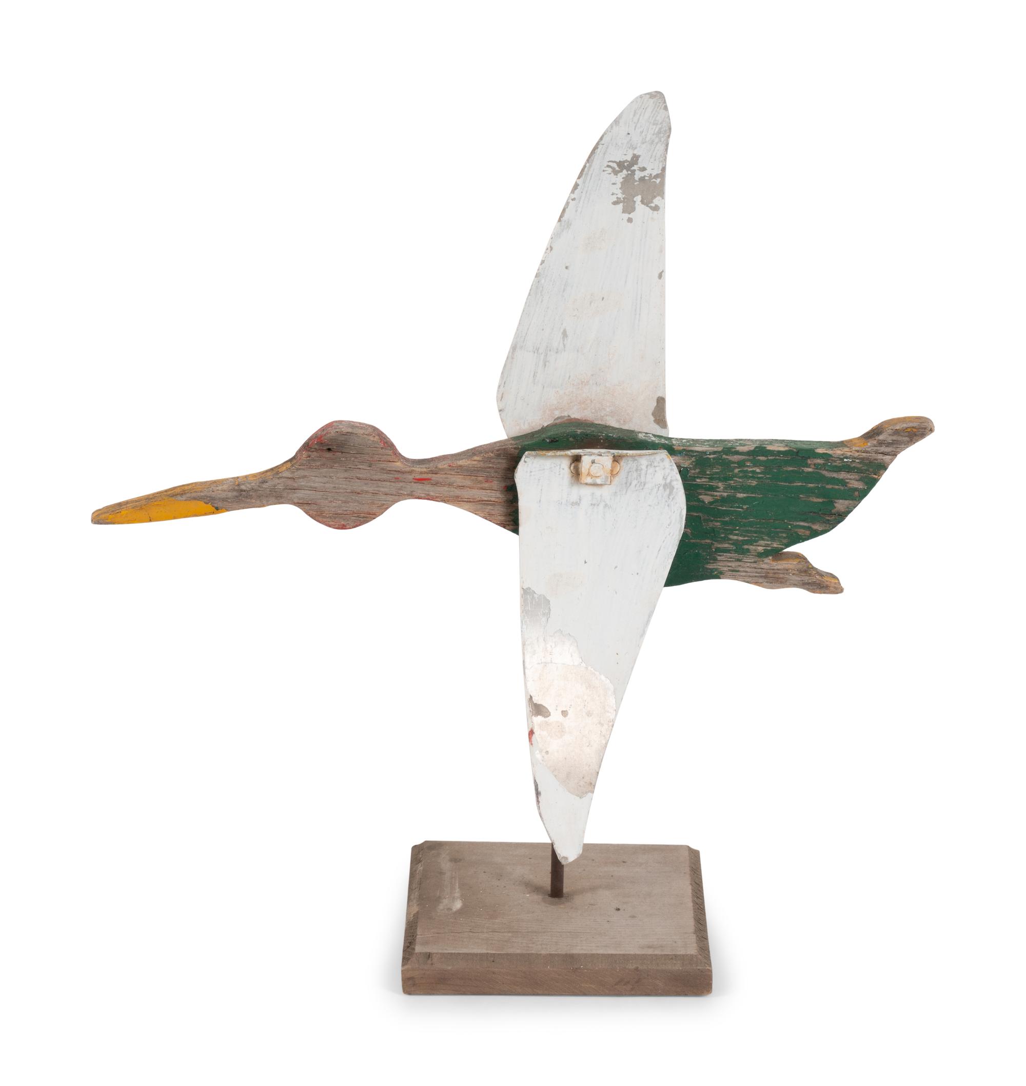 A Painted Tin and Carved Wood Duck Whirligig