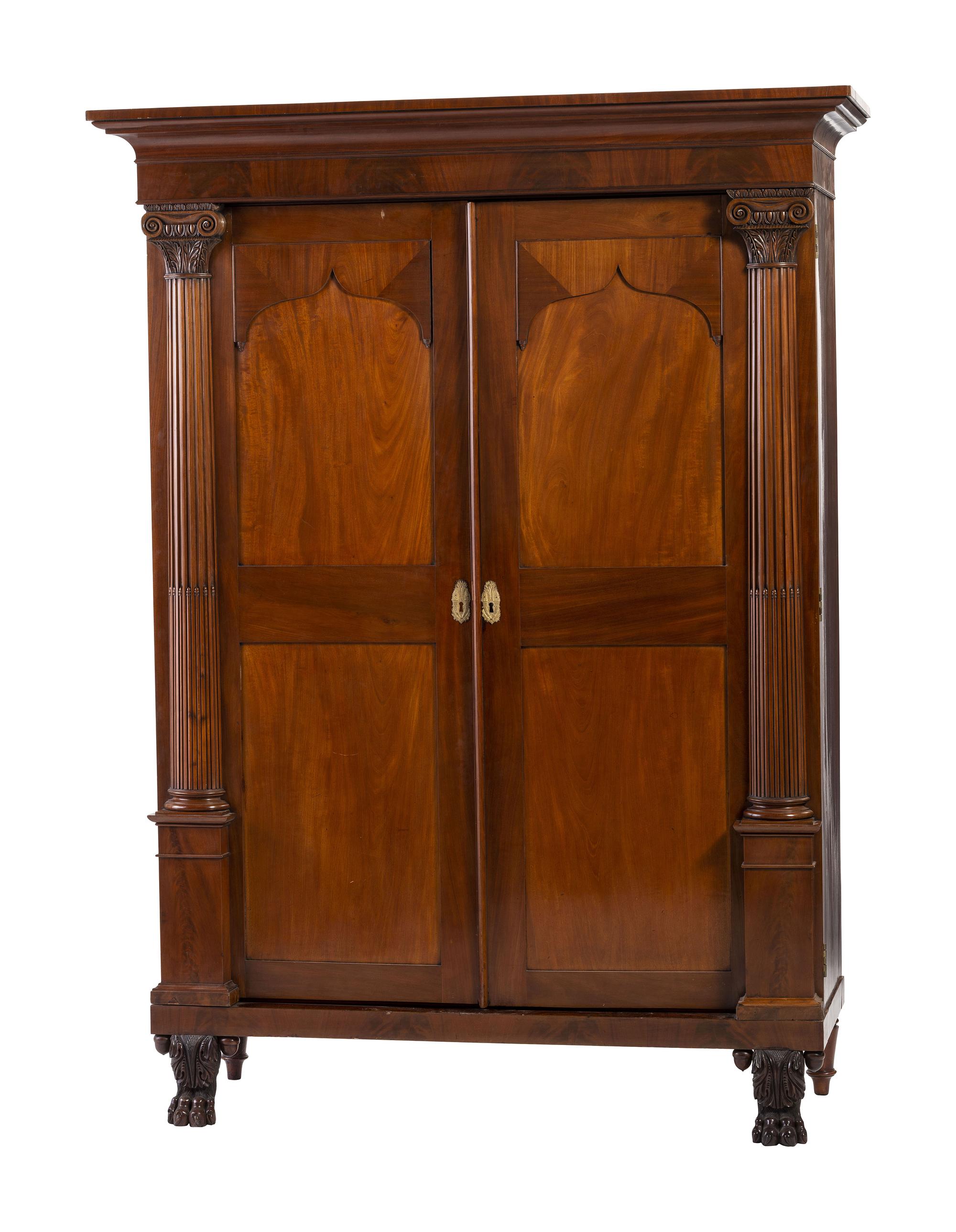 A Classical Carved and Highly Figured Mahogany Wardrobe