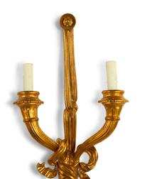 A Pair of Continental Gilt Bronze Two-Light Sconces