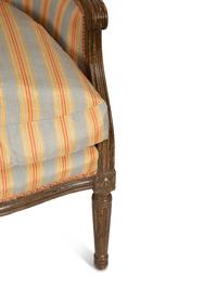 A Pair of Louis XVI Style Faux Finish Bergeres