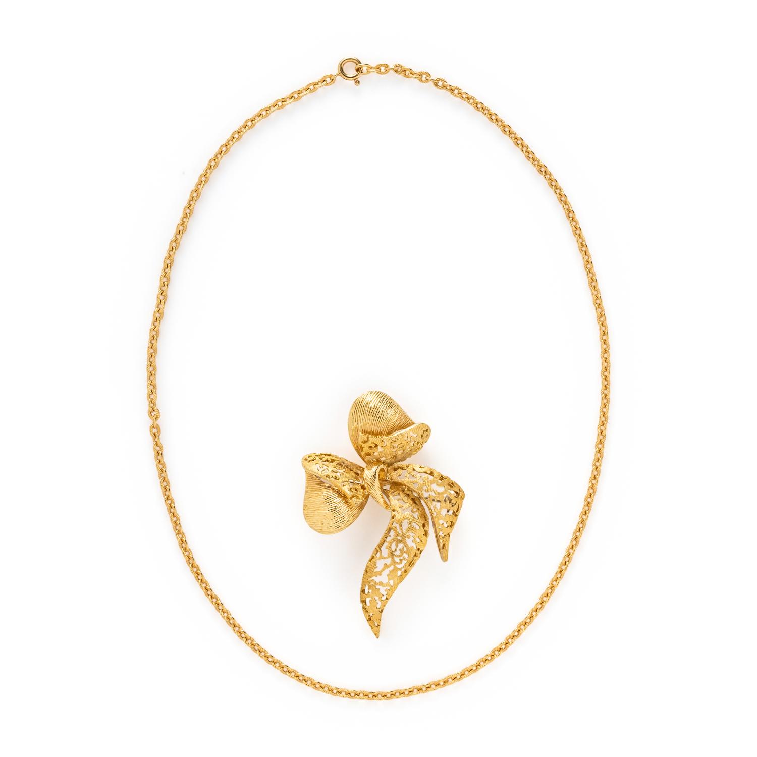 YELLOW GOLD BOW BROOCH AND CHAIN NECKLACE