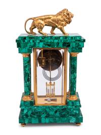 An Empire Style Gilt Metal and Malachite Veneered “Crystal Regulator" Clock