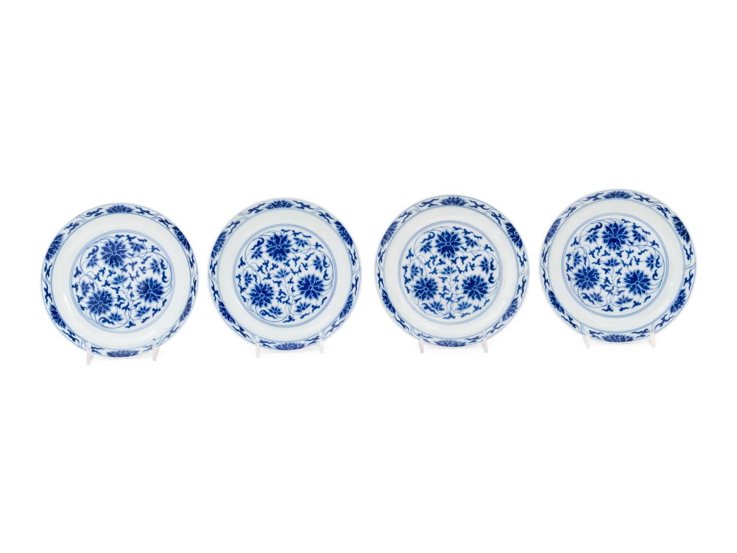 Four Chinese Blue and White Porcelain 'Lotus' Plates
