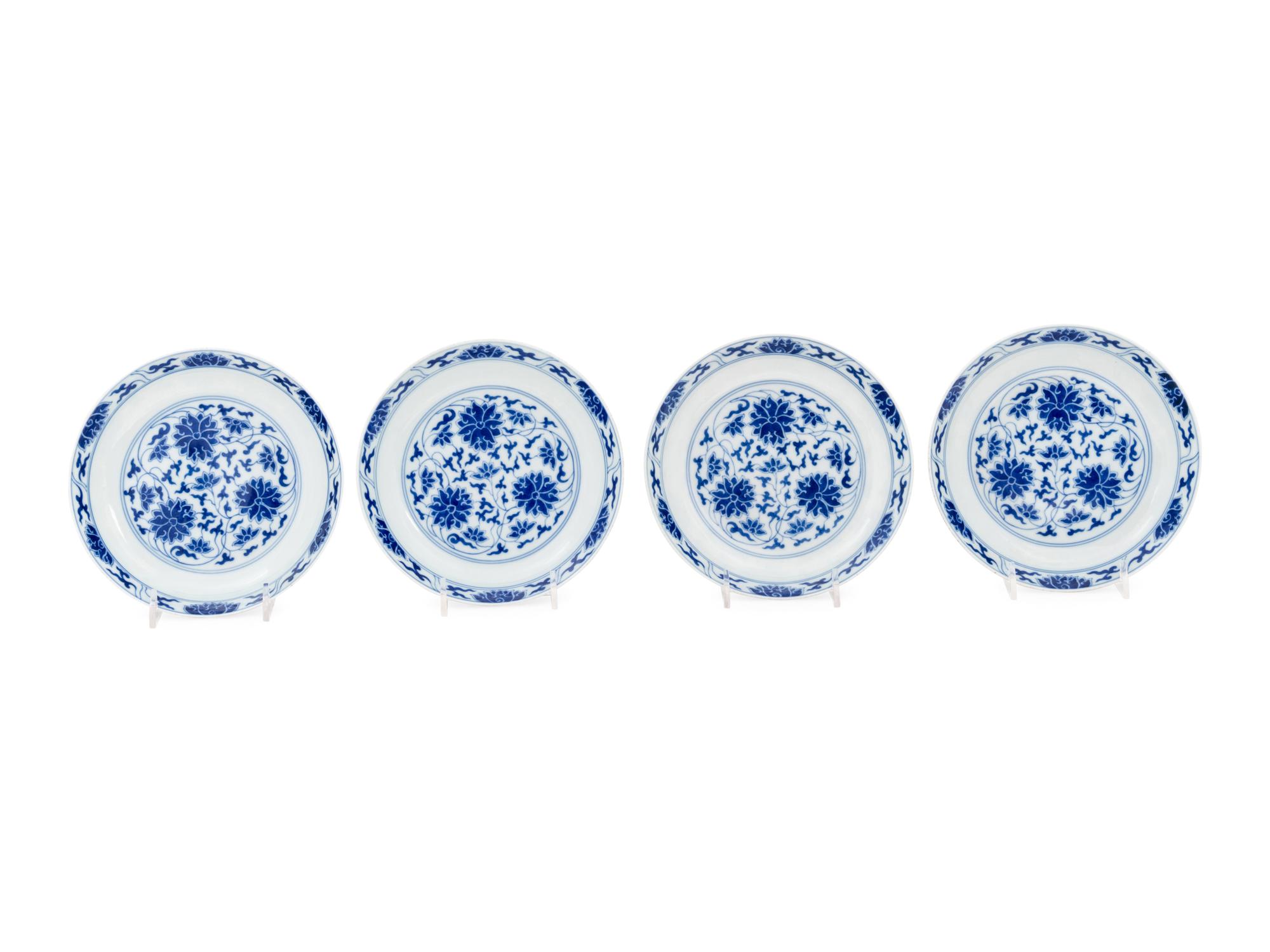 Four Chinese Blue and White Porcelain 'Lotus' Plates