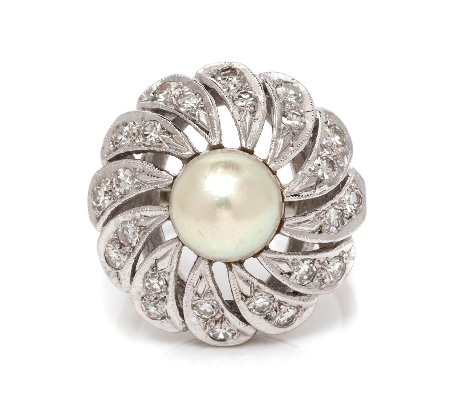 A 14 Karat White Gold, Cultured Pearl and Diamond Ring, 6.20 dwts.