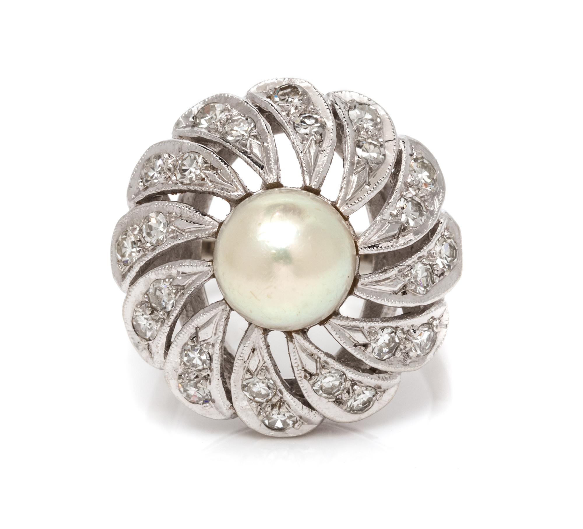 A 14 Karat White Gold, Cultured Pearl and Diamond Ring, 6.20 dwts.