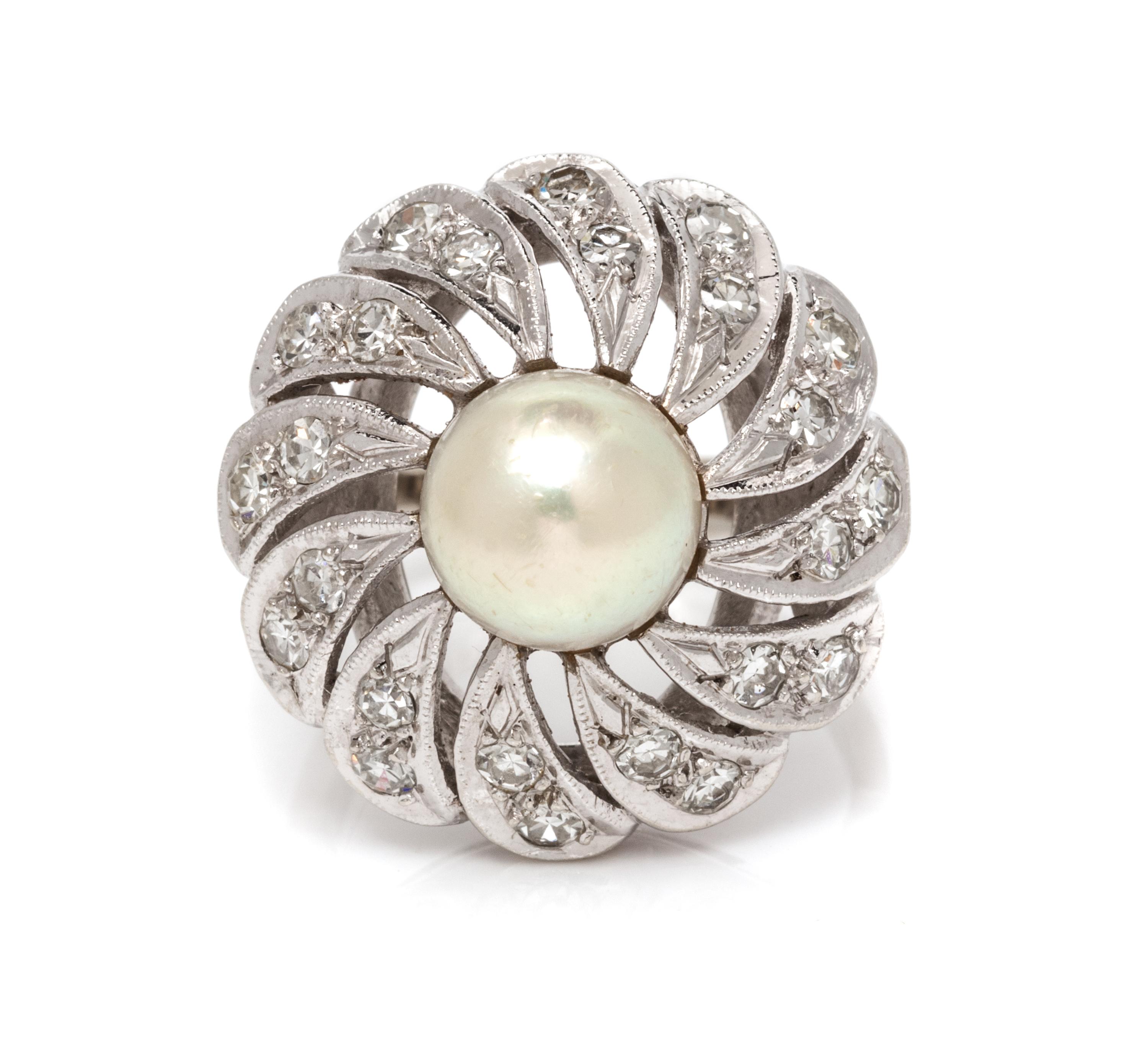 A 14 Karat White Gold, Cultured Pearl and Diamond Ring, 6.20 dwts.