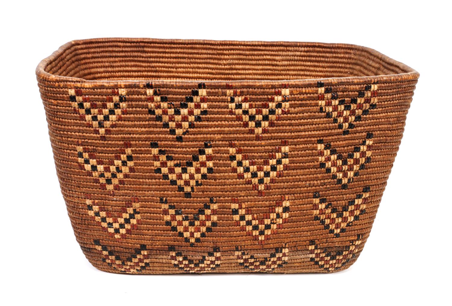 A Large Klickitat Basketry Bowl Height 9 1/4 x width 11 1/4 x length 16 1/8 inches.