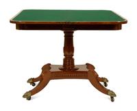 A Pair of Regency Flame Mahogany Flip-Top Games Tables — 19TH CENTURY
