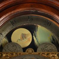 An English Carved Mahogany Tall Case Clock