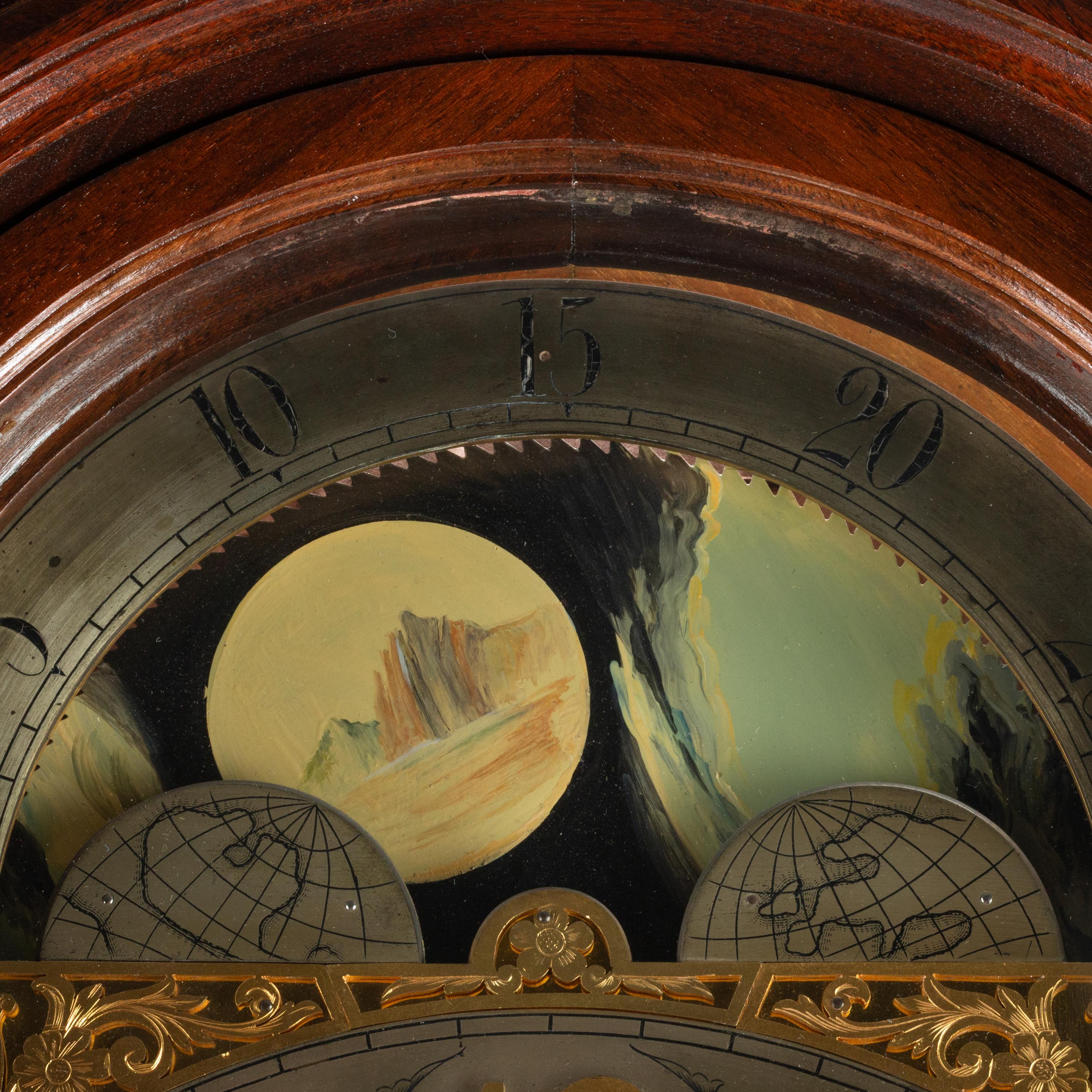 An English Carved Mahogany Tall Case Clock