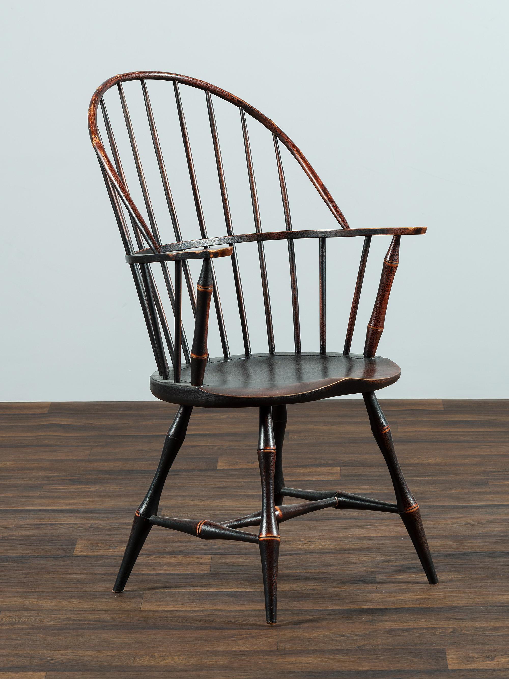 A David T. Smith Black Painted Sack-Back Windsor Armchair
